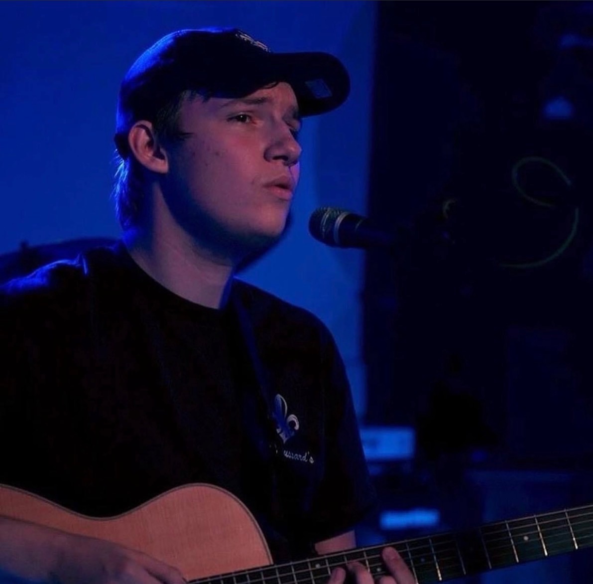 Skyler Kelly, live music performer at Five Oaks Taproom